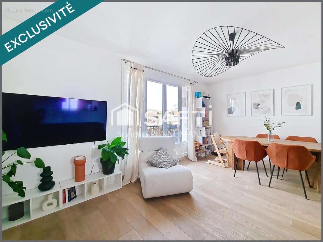 Photo 2 - Appartement à COURBEVOIE