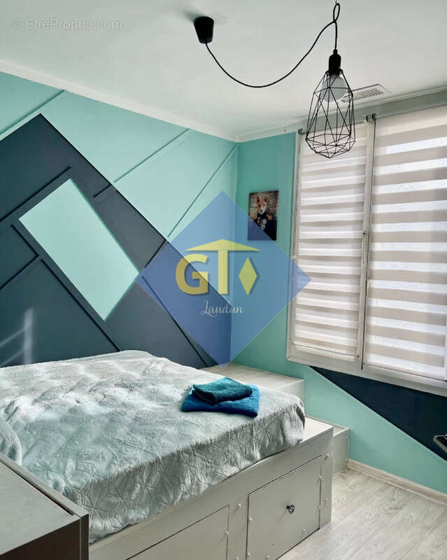 Maison à LAUDUN-L'ARDOISE