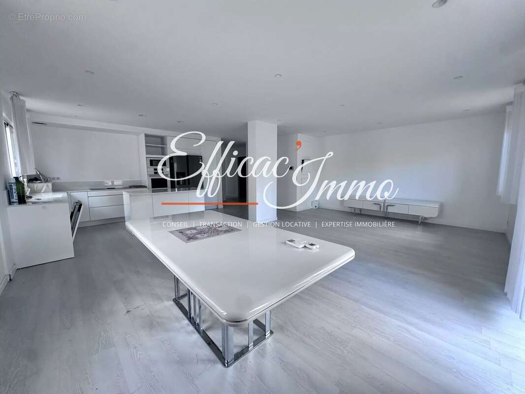 Bien à usage mixte de 154,51 m² avec garage, jardin et prestations haut de gamme - photo 2