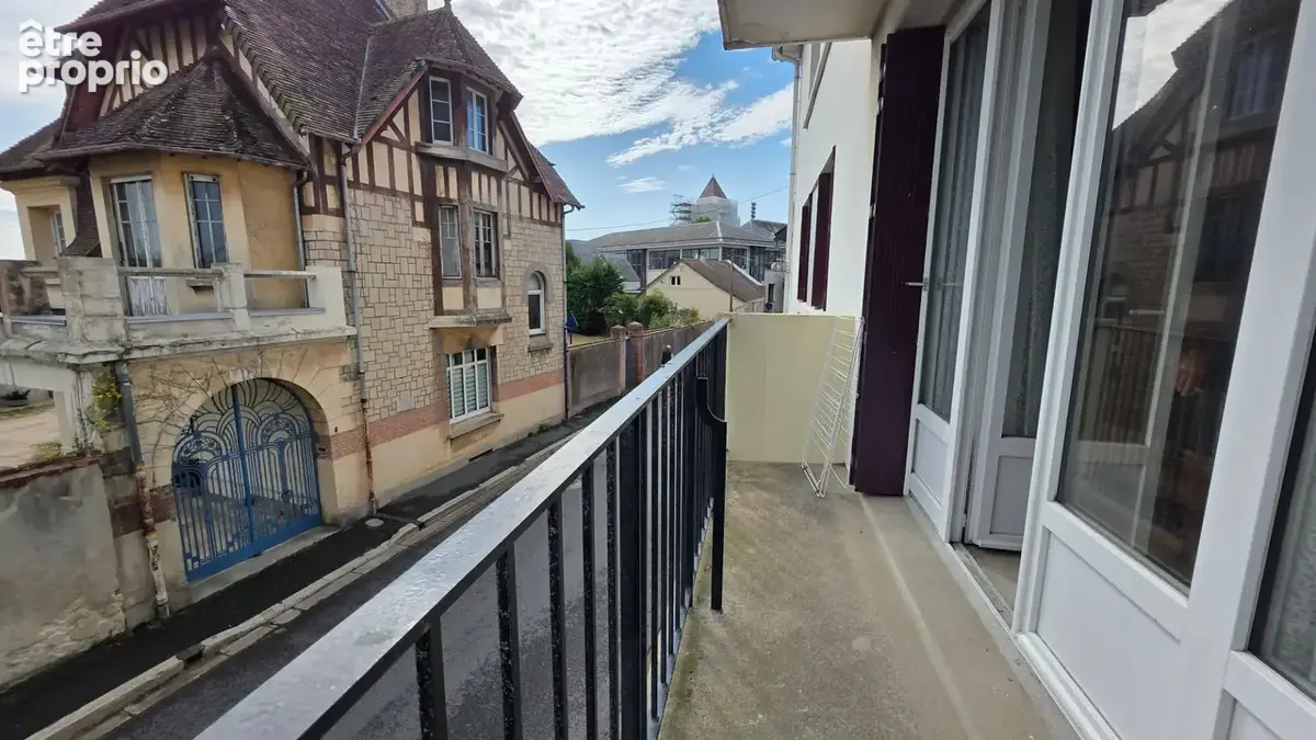 Appartement  4 pièce(s) avec balcon, garage et cave - photo 4