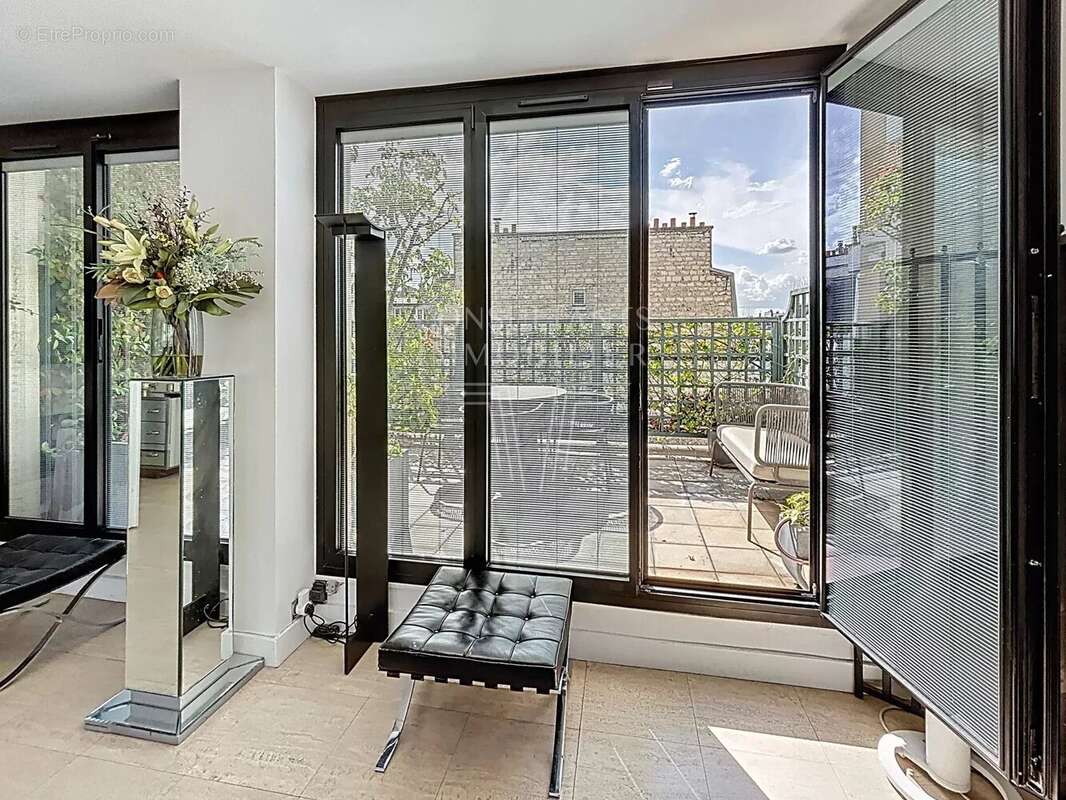Appartement traversant terrasse 14 m² ouest - photo 5