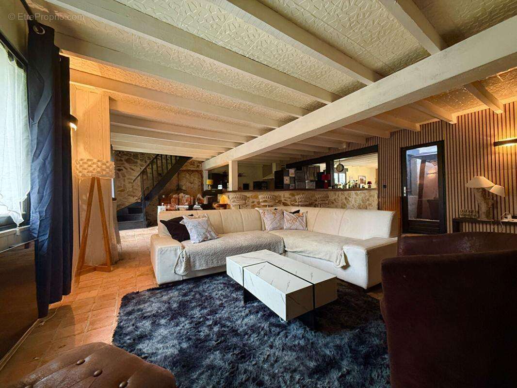 Maison à CHAMPIGNE