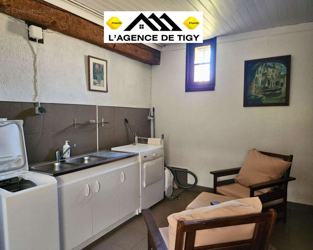 A vendre une charmante maison - photo 11