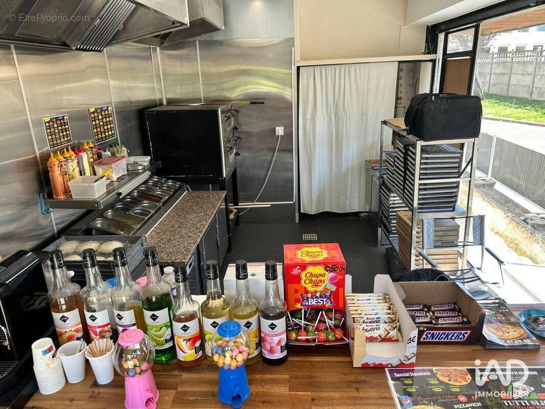 Photo 1 - Commerce à HERBLAY