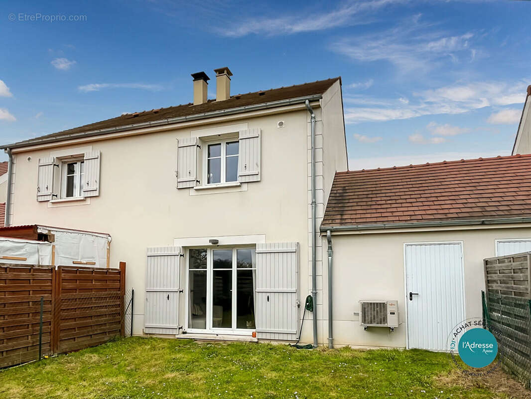 Maison mitoyenne avec 2 chambres jardin et garage - photo 8