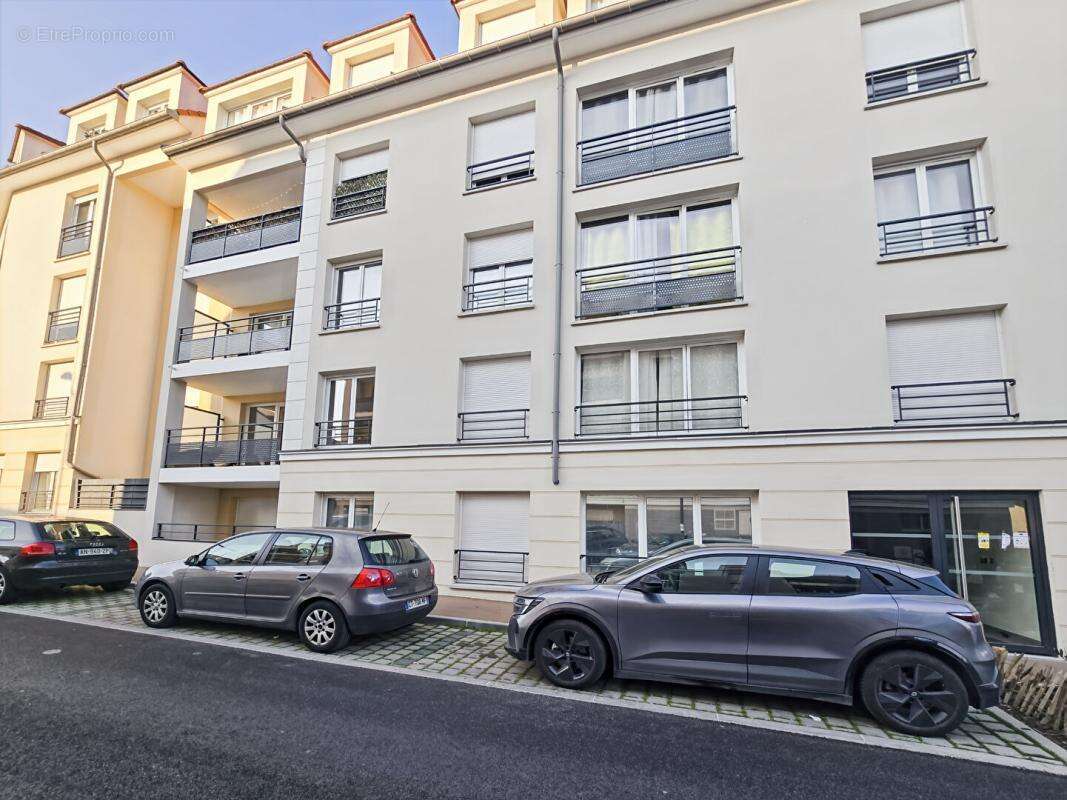 Appartement 3 pièces de 71 m2 avec jardin et 2 places de stationnement en sous-sol - photo 6