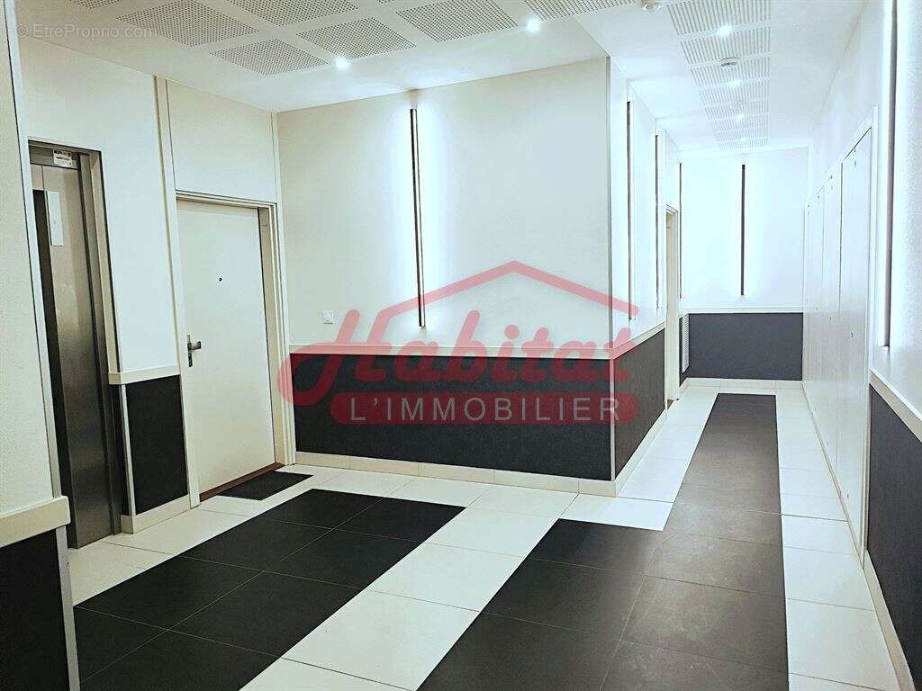 3 pièces neuf centre-ville + 2 parkings en sous-sol - photo 13