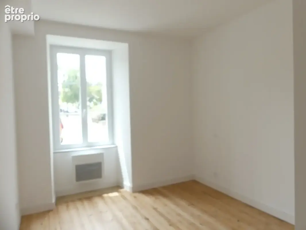 Immeuble de 3 appartements en centre bourg - photo 6