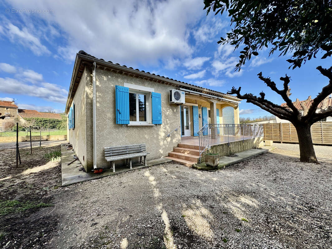 Maison à LAUDUN-L'ARDOISE