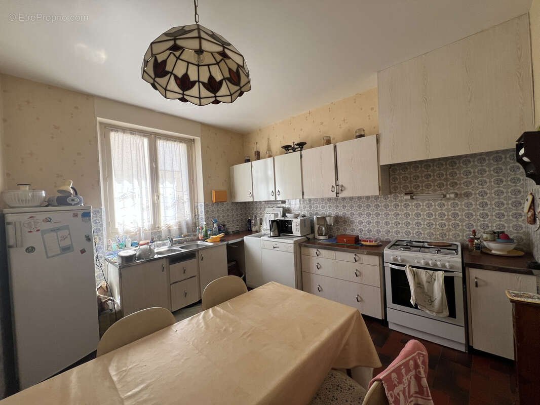 Ensemble Immobilier de deux maisons de ville avec commerce ! - photo 12