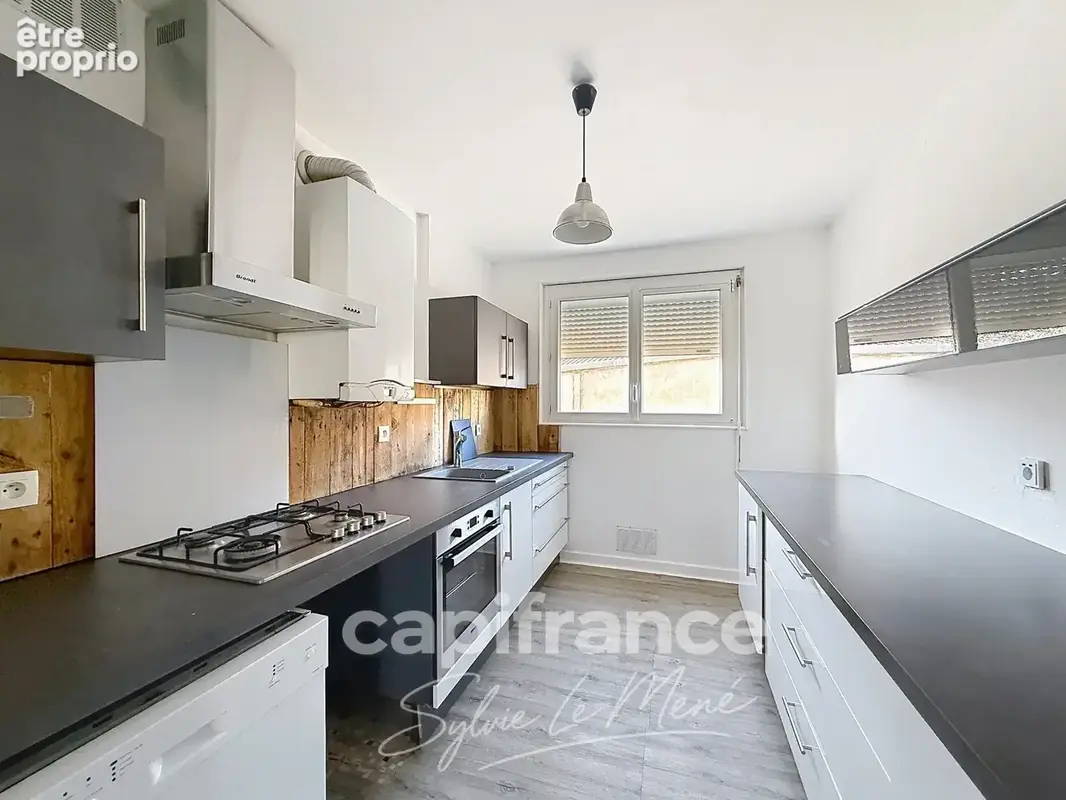 À vendre appartement T3 71 m² à vendre à Pontivy – 2 chambres, balcon, cave et parking - photo 5