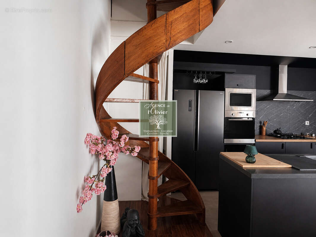 Loft d'architecte avec terrasse et parking en coeur de ville - photo 3