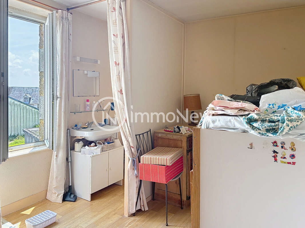 Maison mitoyenne a renover 100 m2 sur terrain 600 m2 environ en plein bourg - photo 11