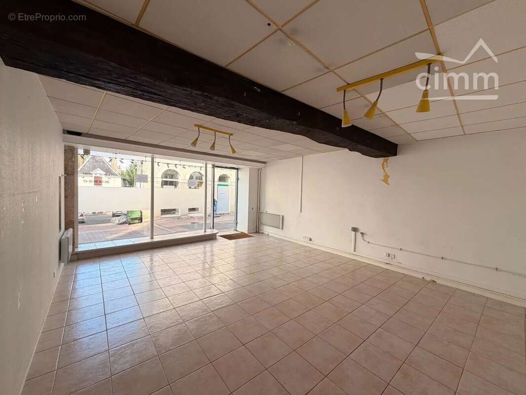 Immeuble de rapport avec local commercial loué et deux appartements - photo 11