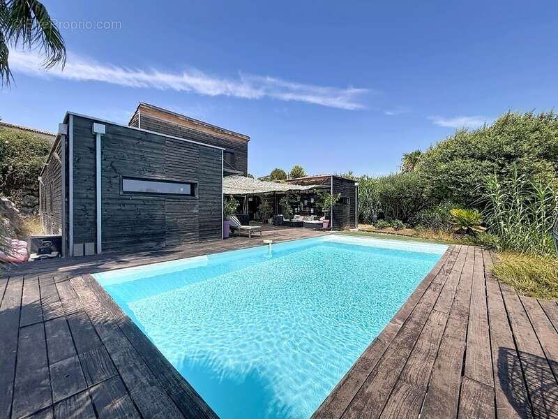 Juvignac : fontcaude – villa contemporaine en bois avec piscine et vue panoramique sur le golf - photo 2