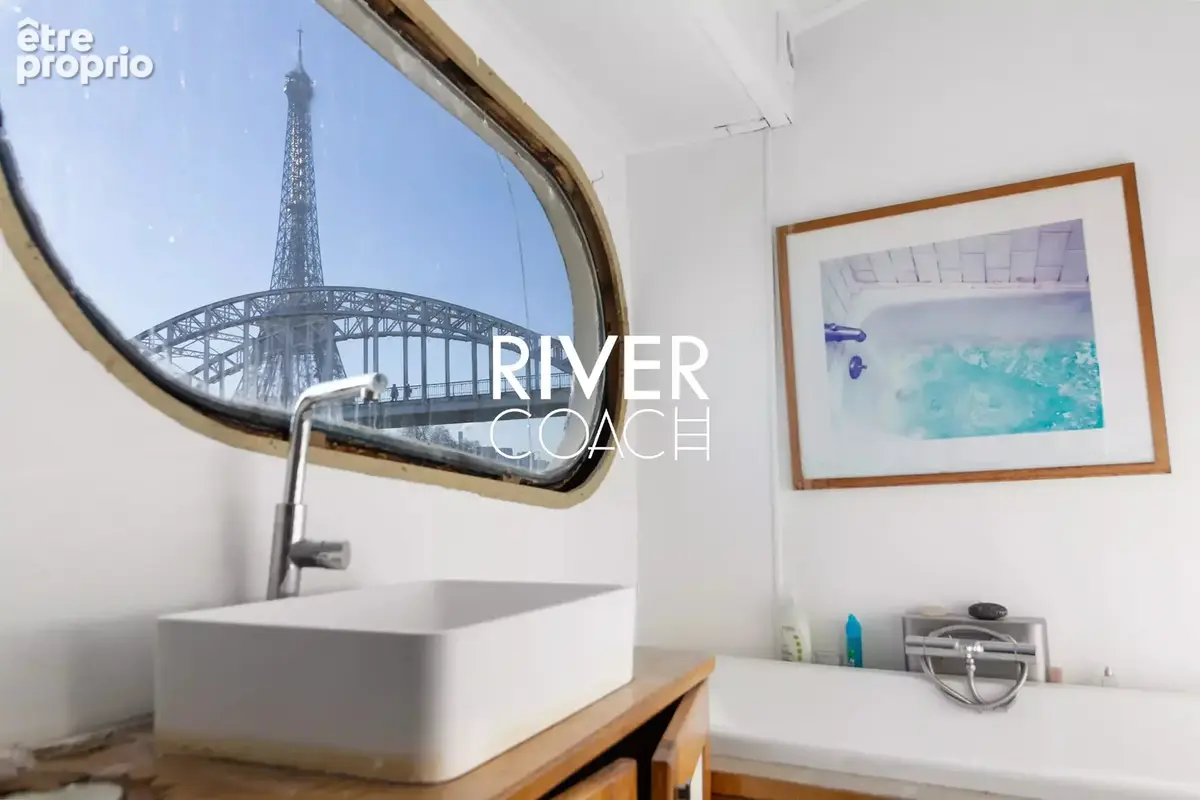 Péniche d’Exception de 150 m² avec Terrasse et Vue Iconique à Paris - photo 13