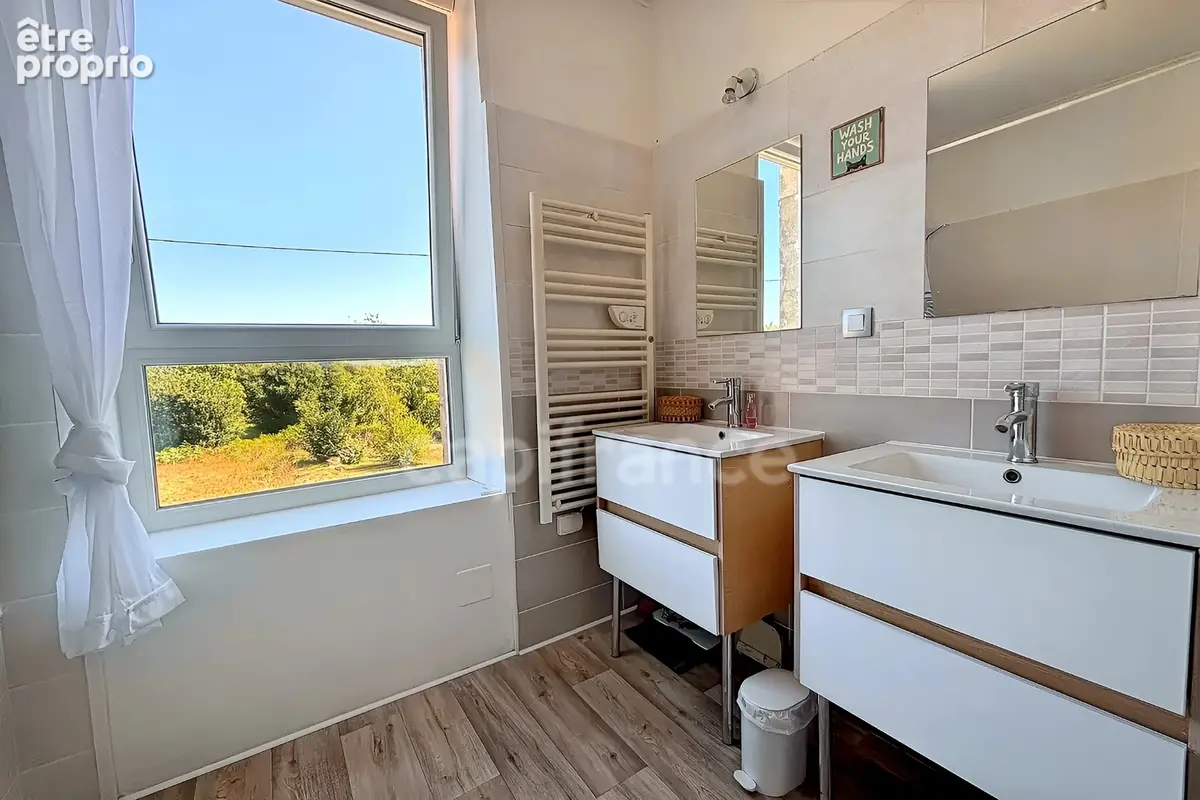 Charmante maison en pierre de 122m², 3 chambres avec jardin, terrasse, cave à GUENGAT(29) - photo 10