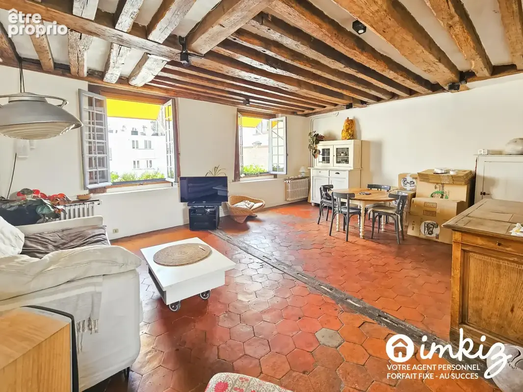 Duplex atypique en dernier étage - photo 3
