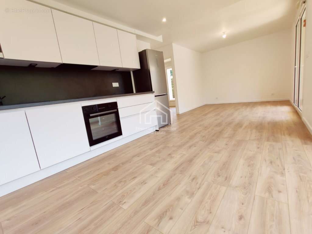 Magnifique appartement en rez de jardin rénové à neuf - photo 11