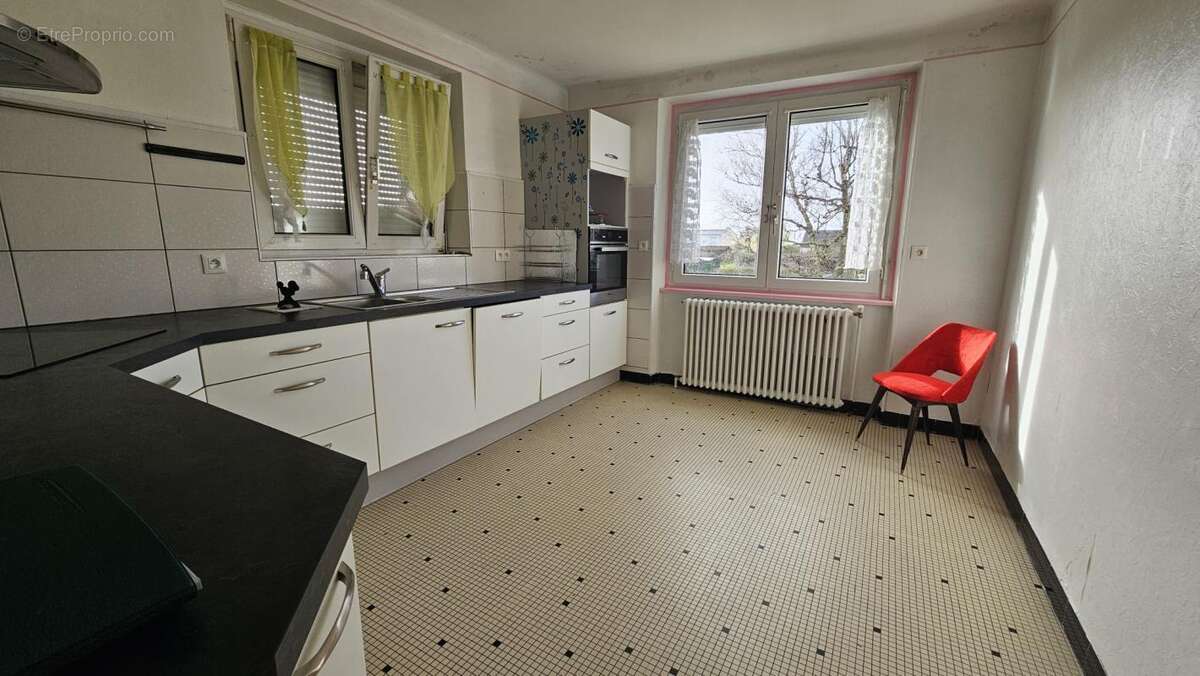 Maison surélevée sur sous-sol - photo 12