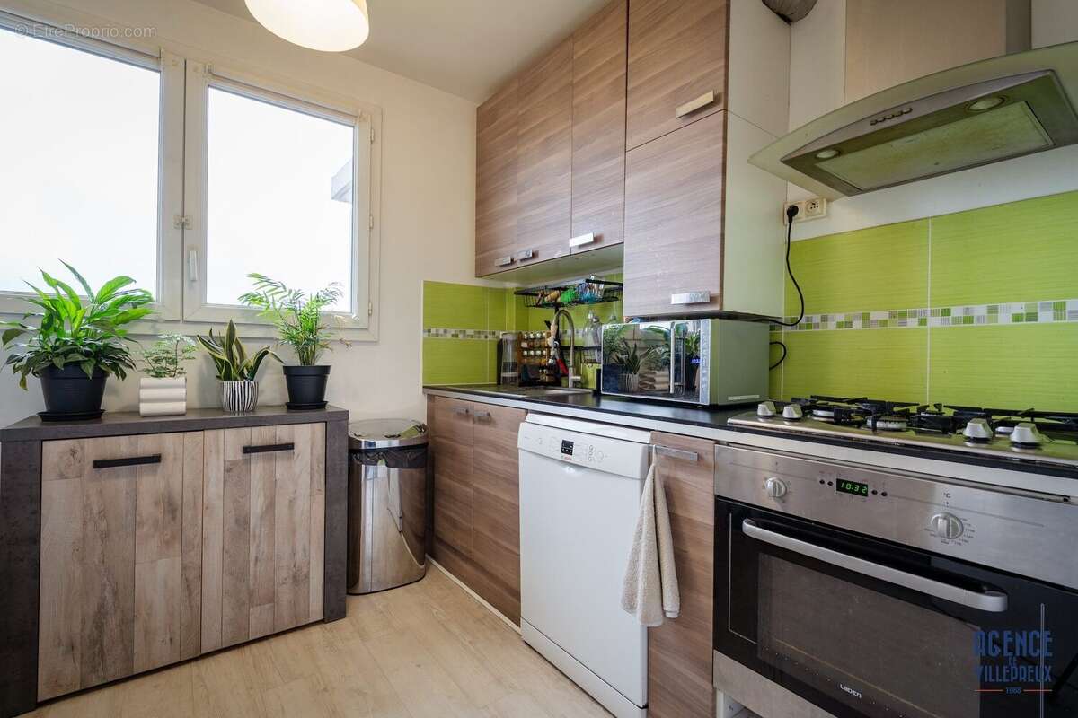Appartement 56 m² à Les Clayes-Sous-Bois  - photo 2