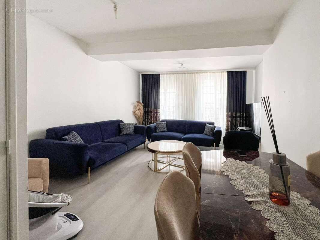 Duplex chaleureux en plein cœur de ville - Intention de division d’un immeuble - photo 7