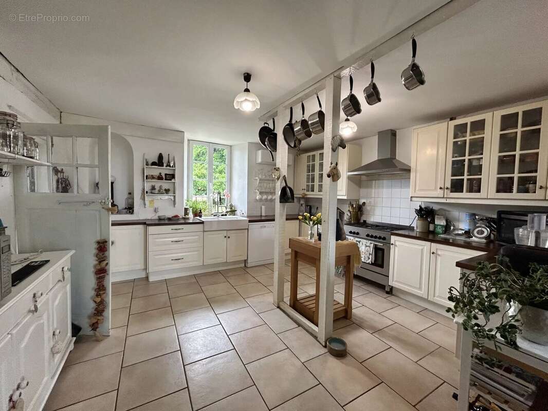 Ferme de caractère avec 4 à 5 chambres, 1,5 hectares de terrain et possibilité de gîte - photo 7