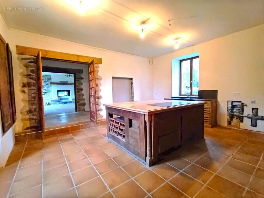 Maison à HENANBIHEN