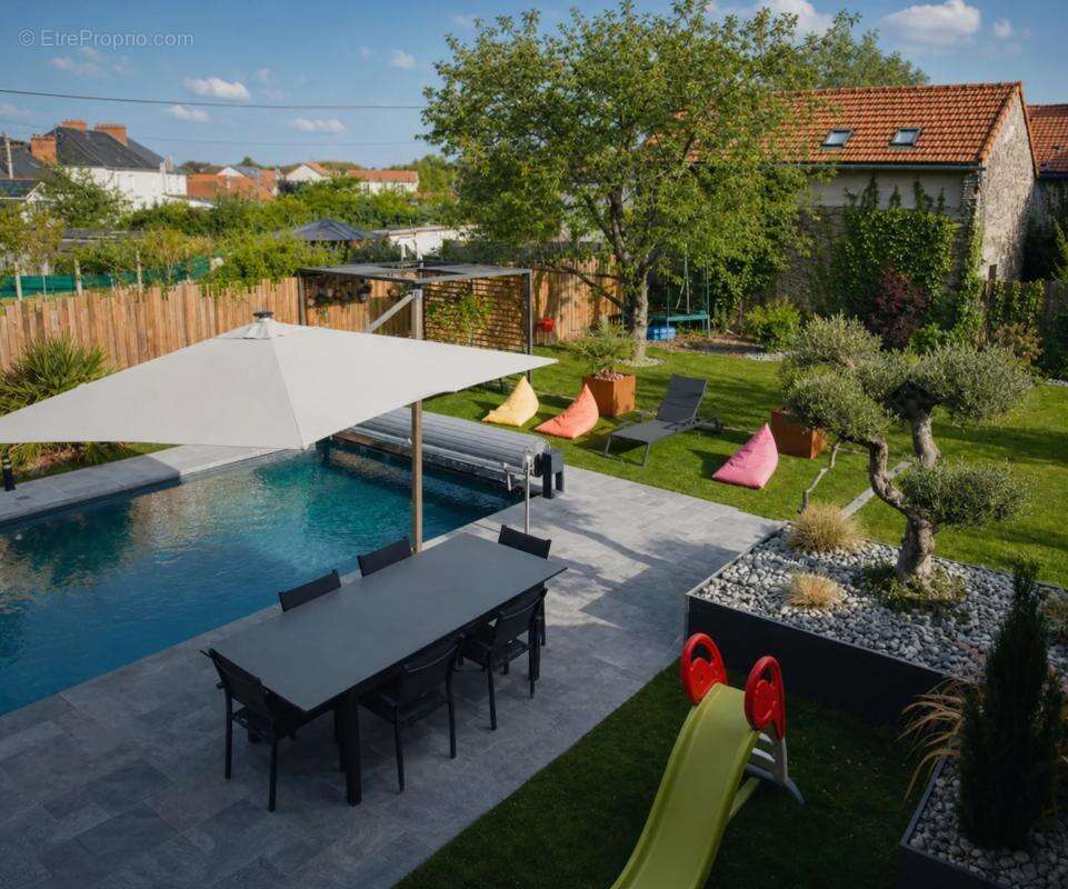Maison de 10 pièces de 180 m² à Cholet - photo 23