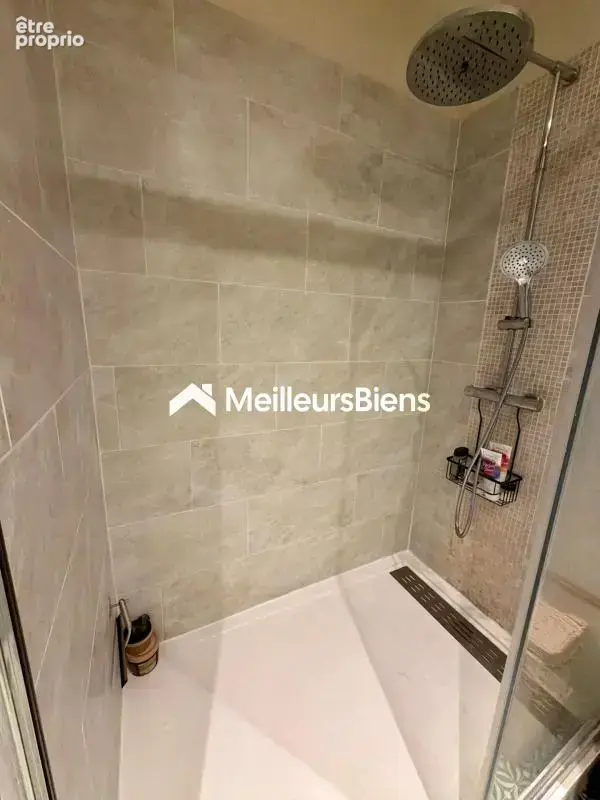 Laval – Secteur gare – Appartement de charme d’environ 80 m² avec 2 chambres et cave - photo 12