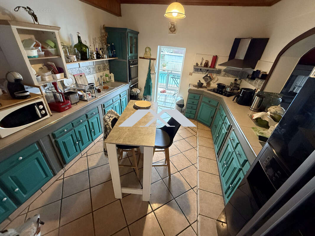 Maison 190 m² à Saint-Benoit  - photo 3