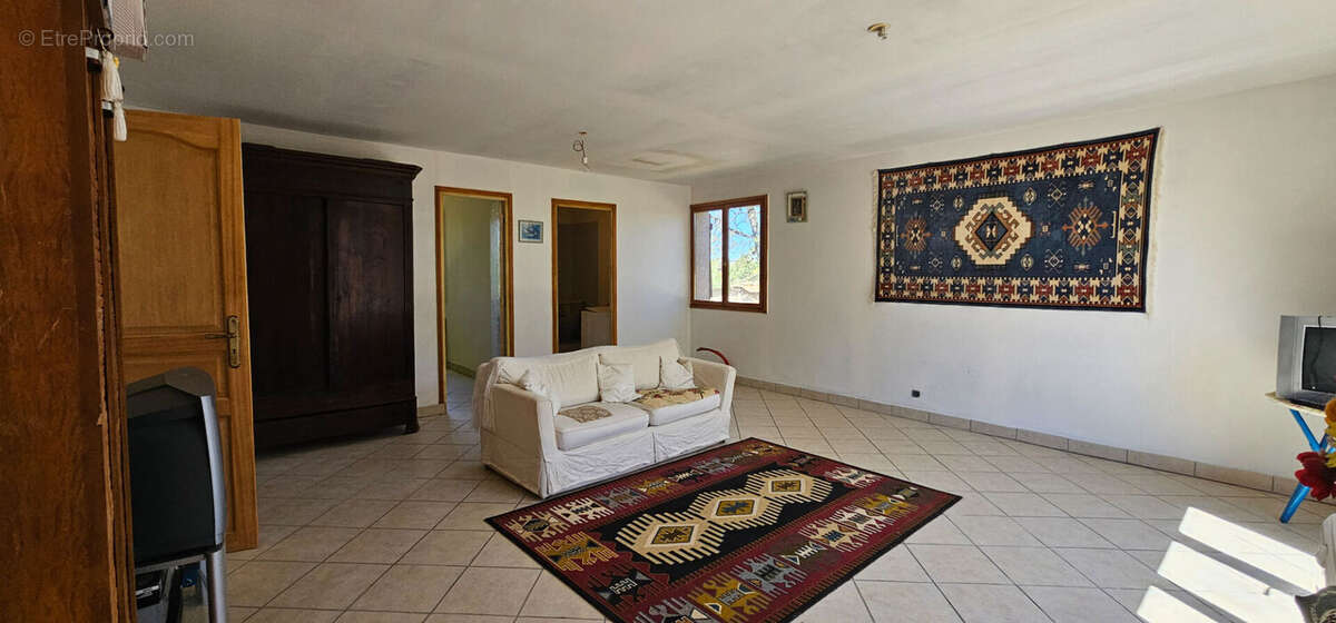 Maison de plain-pied de 163m² - photo 12