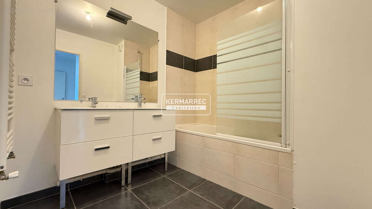 VERTOU BEAUTOUR - Appartement T4 lumineux avec terrasse et 2 parkings en sous-sol - photo 9