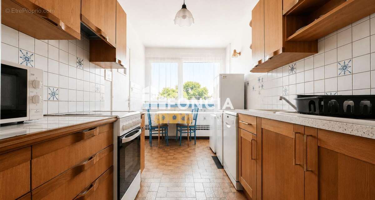 T4 lumineux de 79 m² avec balcon sur parc – Résidence rénovée – Saint-Herblain Est - photo 4