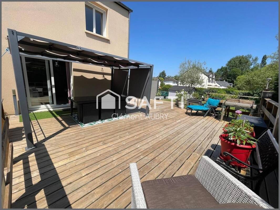 Photo 1 - Maison à LAVAL