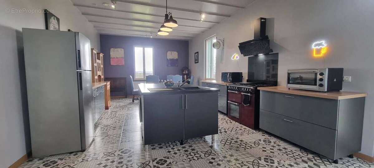 Maison à CASTELNAU-MONTRATIER