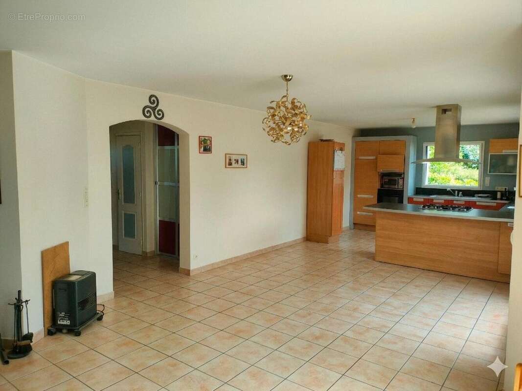 Photo 2 - Maison à PLUGUFFAN