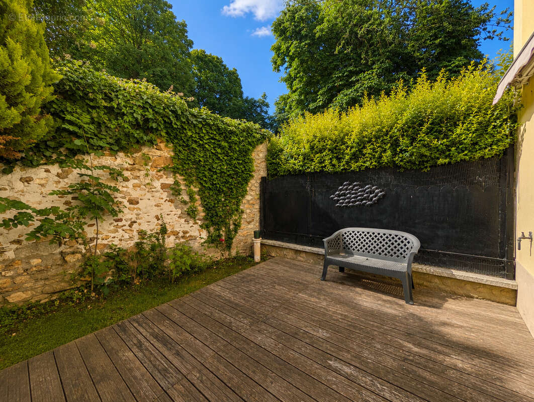 Maison 4 pièces de 100m2 avec 3 chambres et un jardin - photo 2