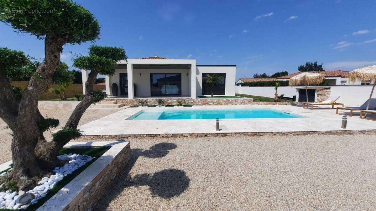 Maison à MONTBETON