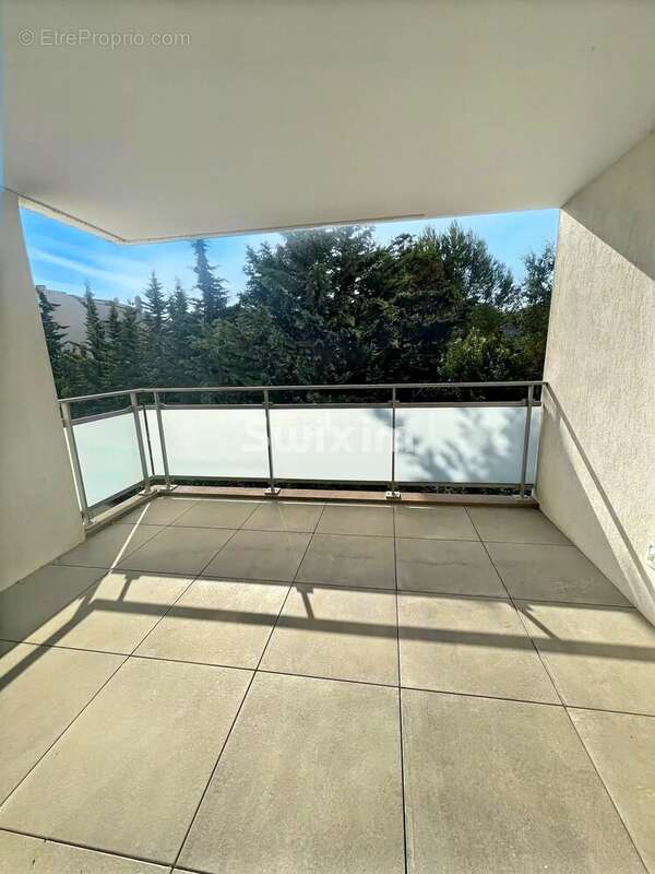 Appartement t3 avec terrasse & double garage - photo 2