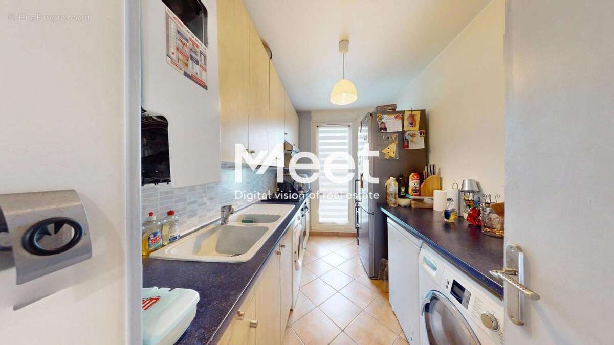 Appartement - 61,67m2 - 2 chambres - balcon - parking - photo 5