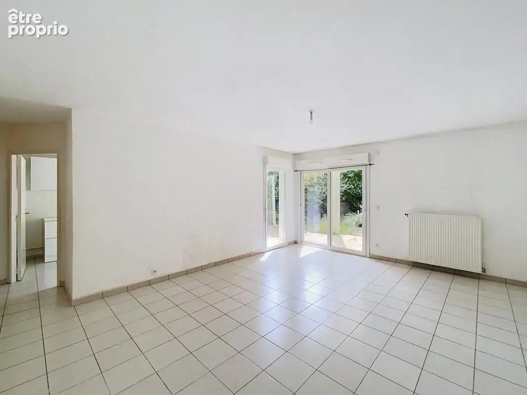 Appartement T3 en rez-de-jardin - photo 4
