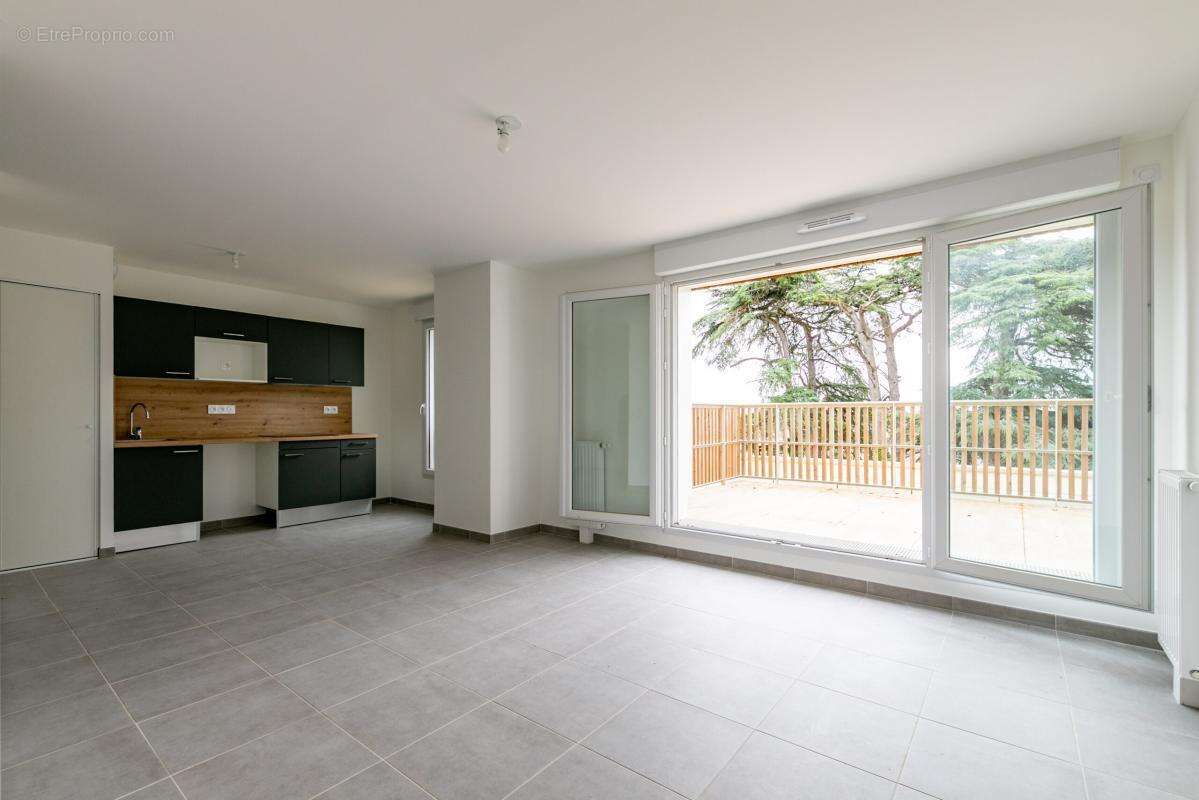 Appartement T3 dernier étage - photo 3
