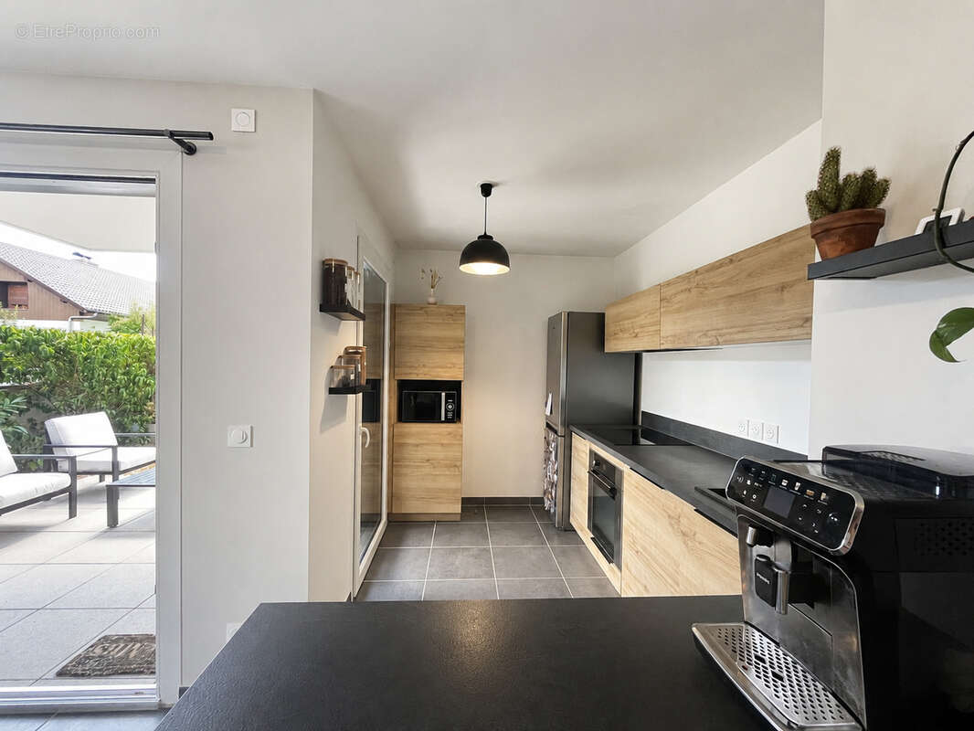 T3 de standing avec terrasse et garage double - photo 5