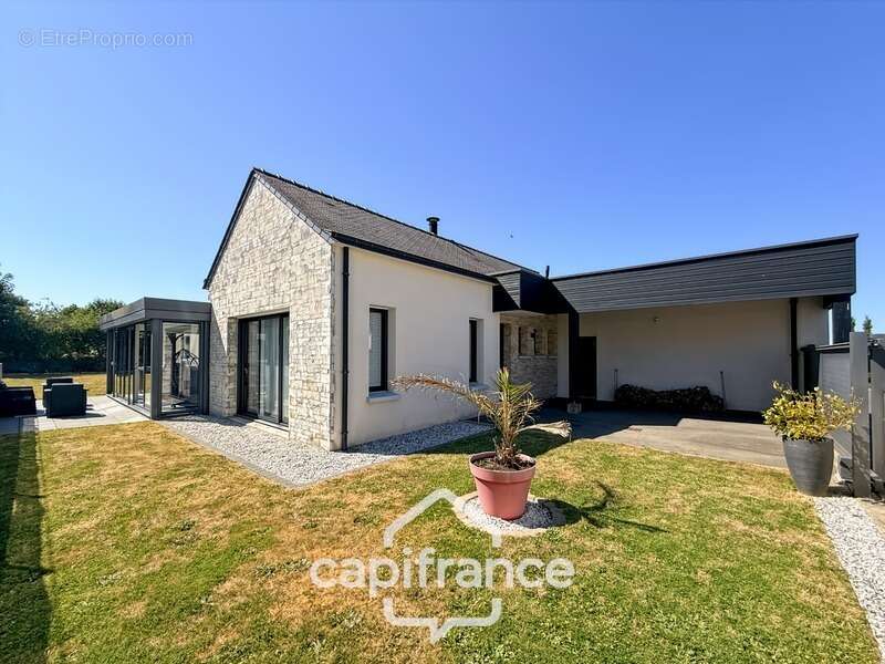 Maison contemporaine de plain-pied de 160 m² – 4 chambres – Véranda de 27 m² avec spa – Double garage – Carport – Noyal-Pontivy - photo 27