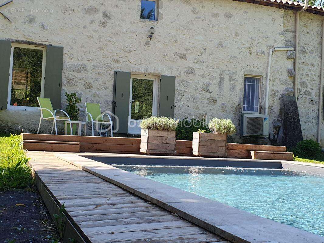 Maison en pierre + gite - etang- 2 piscines- parcelle 8745 m² -st pierre de clairac - photo 4