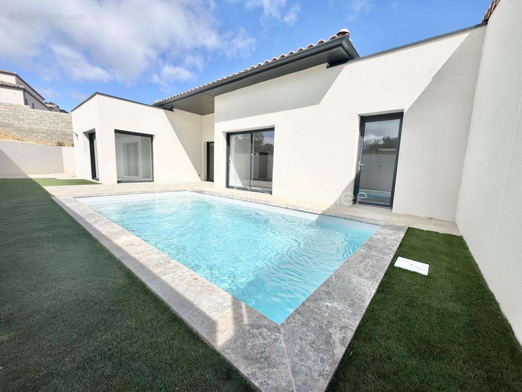 Villa contemporaine T4 de plain-pied 120m2 ,garage et piscine - photo 10