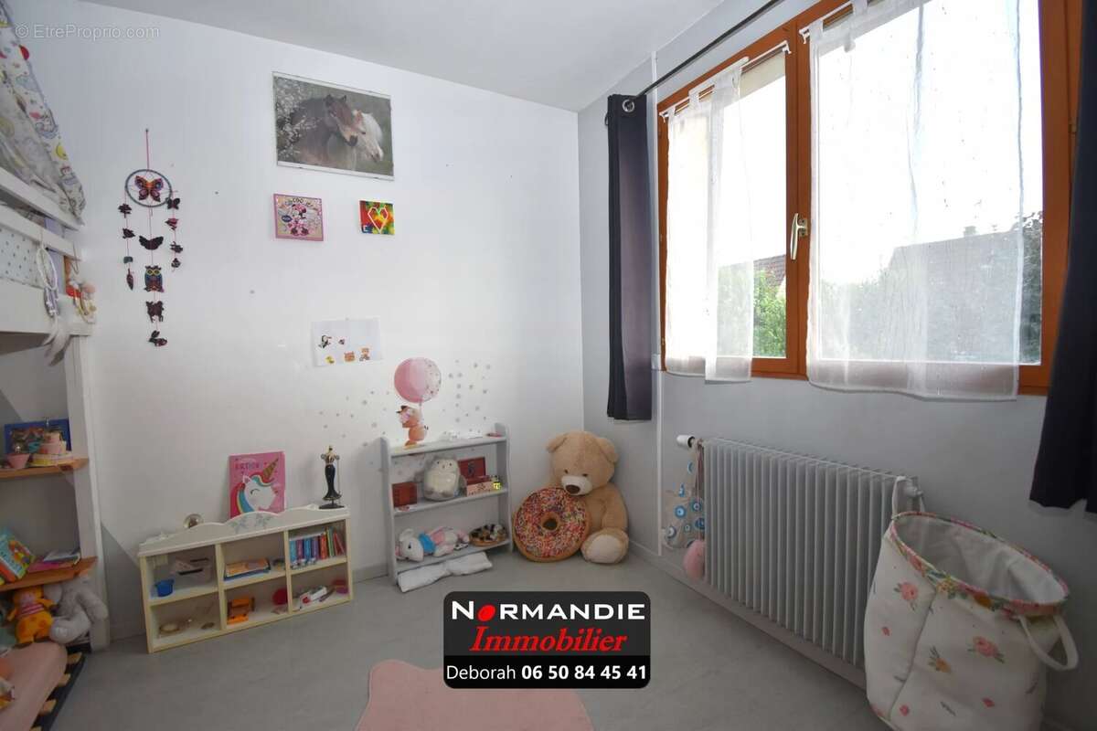 Maison familiale 115 m² –  3 chambres + 1 chambre d'enfant ou bureau – Jardin clos – Secteur recherché de Maromme - photo 13