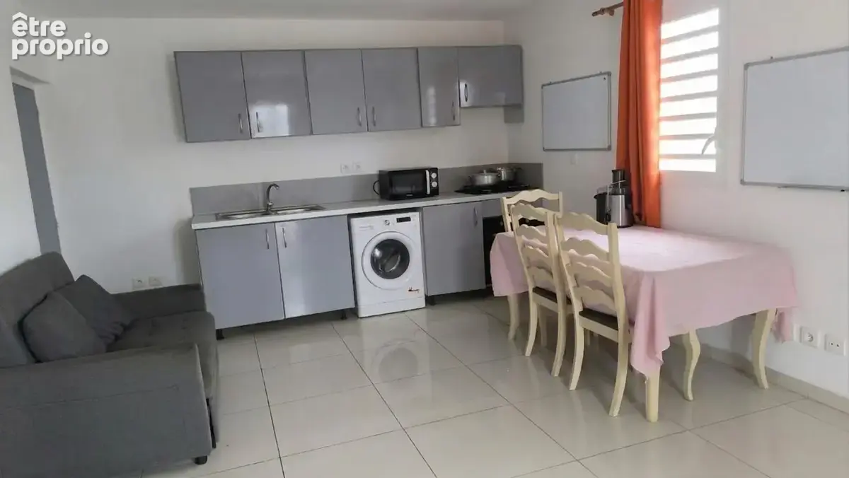 Immeuble de rapport constitué de 4 appartements au moule(97160) - photo 9