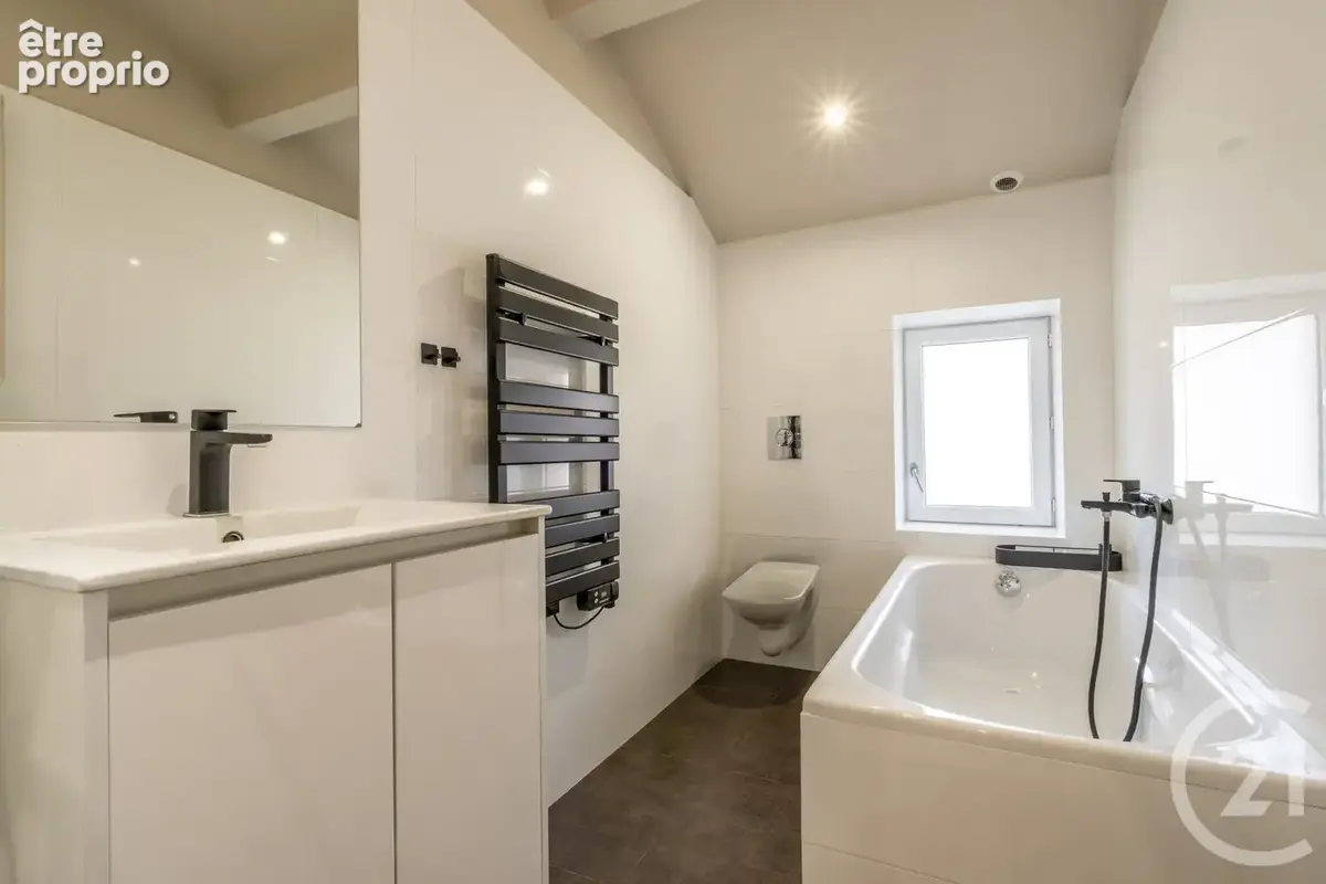 Maison 6 pièces 115 m² à vendre à Miserieux (01600) - photo 7